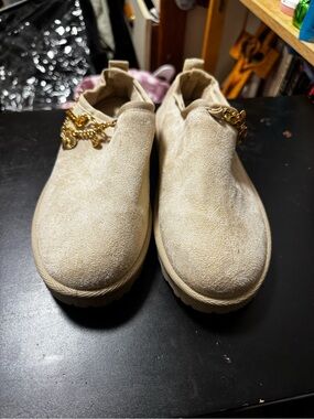 Beige Suede Slip-On Shoes with Gold Charm